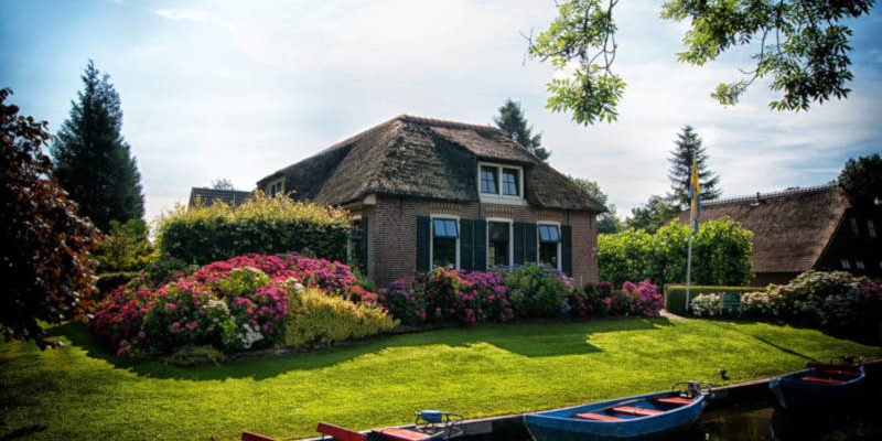 Exterior of a House Surround It by Flowers, Hudack Law Estate Planning Attorney