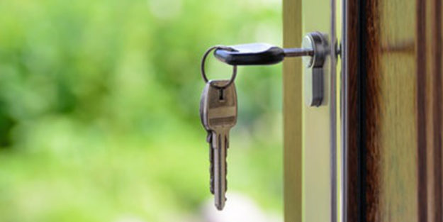 Homeowner Keys Hanging on a Door, Corona Estate Planning Attorney.